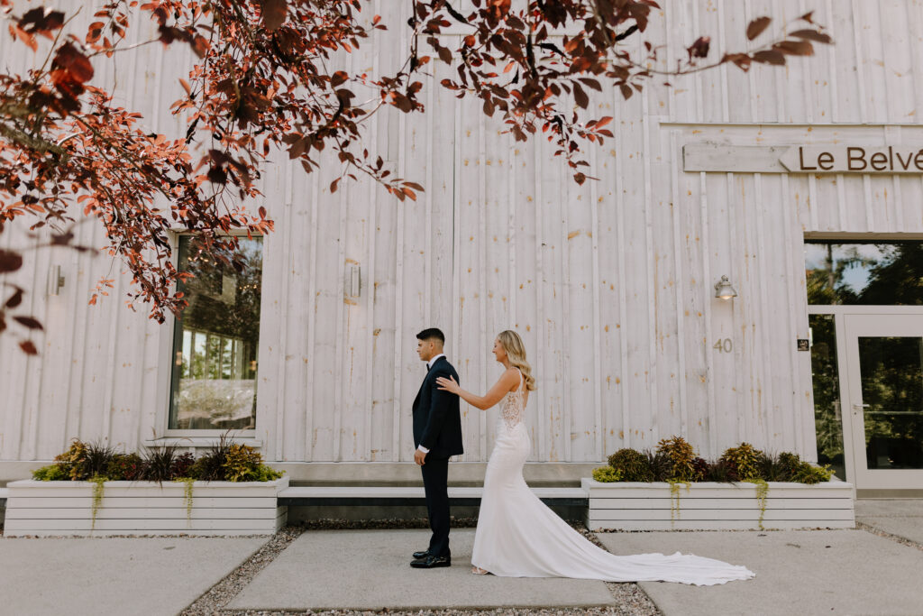 An image showcasing the stunning Le Belvédère wedding venue in Wakefield, Quebec, featuring panoramic views of the Gatineau Hills. Perfect for couples seeking a romantic and elegant wedding location. Captured by Alexis Lavoie Photography, this photo highlights why Le Belvédère is a top choice for unforgettable celebrations.