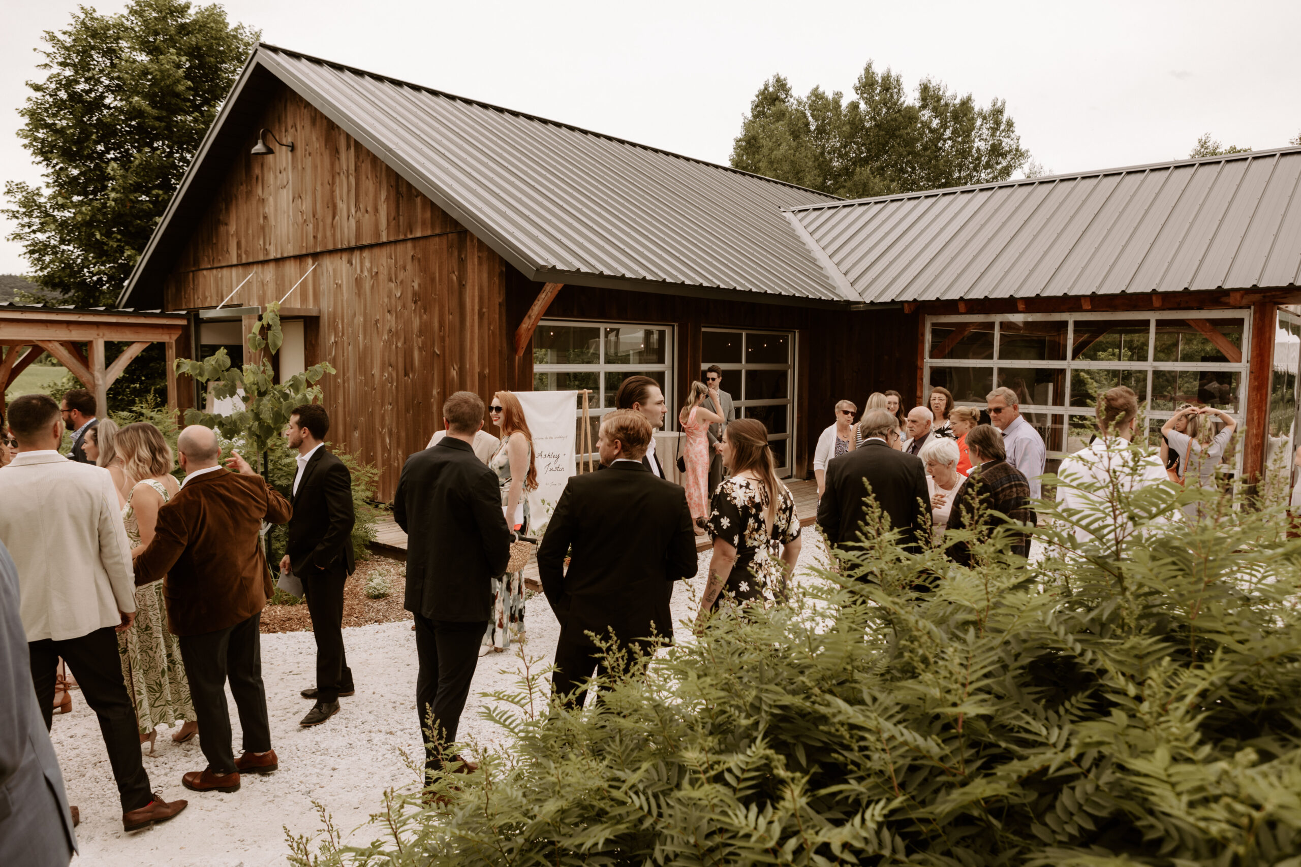 Le Peaches and Cream wedding venue in Low, Quebec captured by Solis and Roam Photography, surrounded by lush greenery.