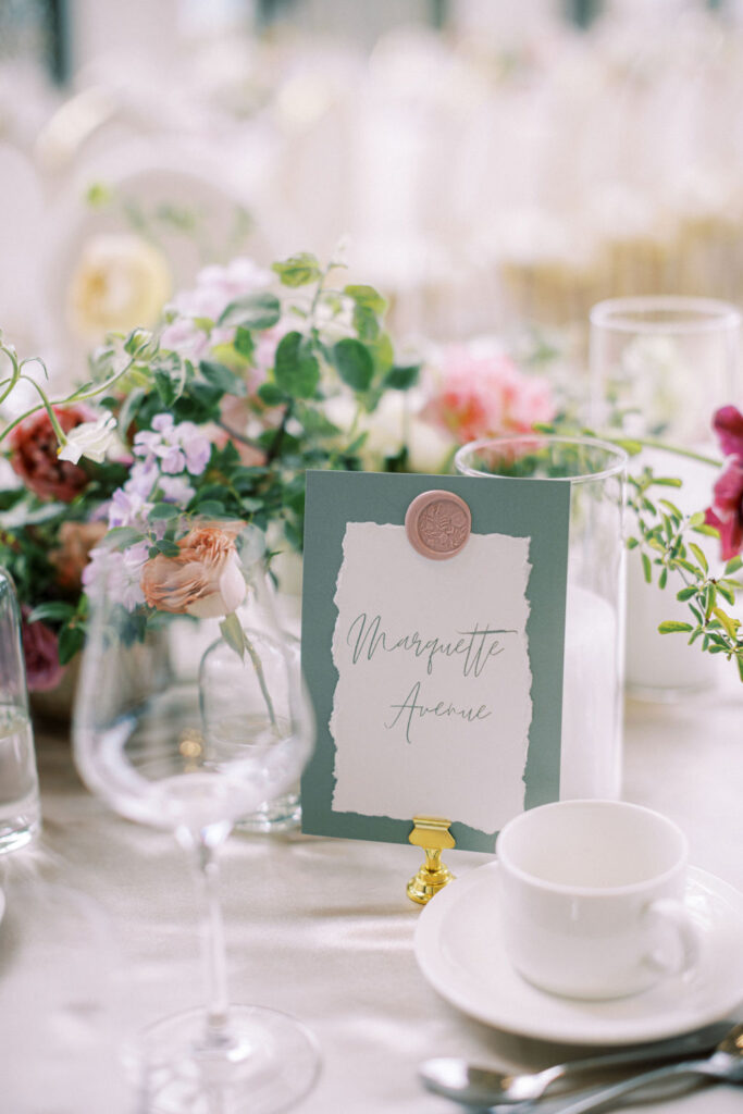 Elegant black tie English garden wedding at the National Arts Centre, captured by Emily Michelson Photography, showcasing lush florals and timeless design.