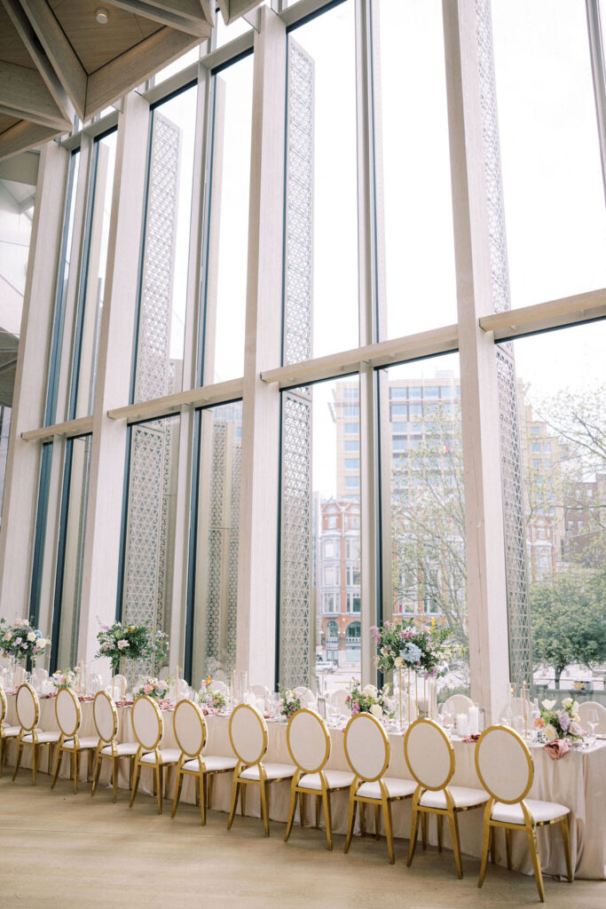 Elegant black tie English garden wedding at the National Arts Centre, captured by Emily Michelson Photography, showcasing lush florals and timeless design.